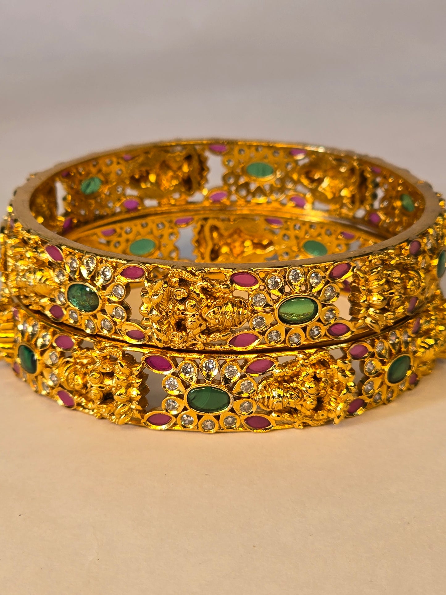 Neroni Temple Elegance Bangles – Gold Finish with Green & Ruby Stones
