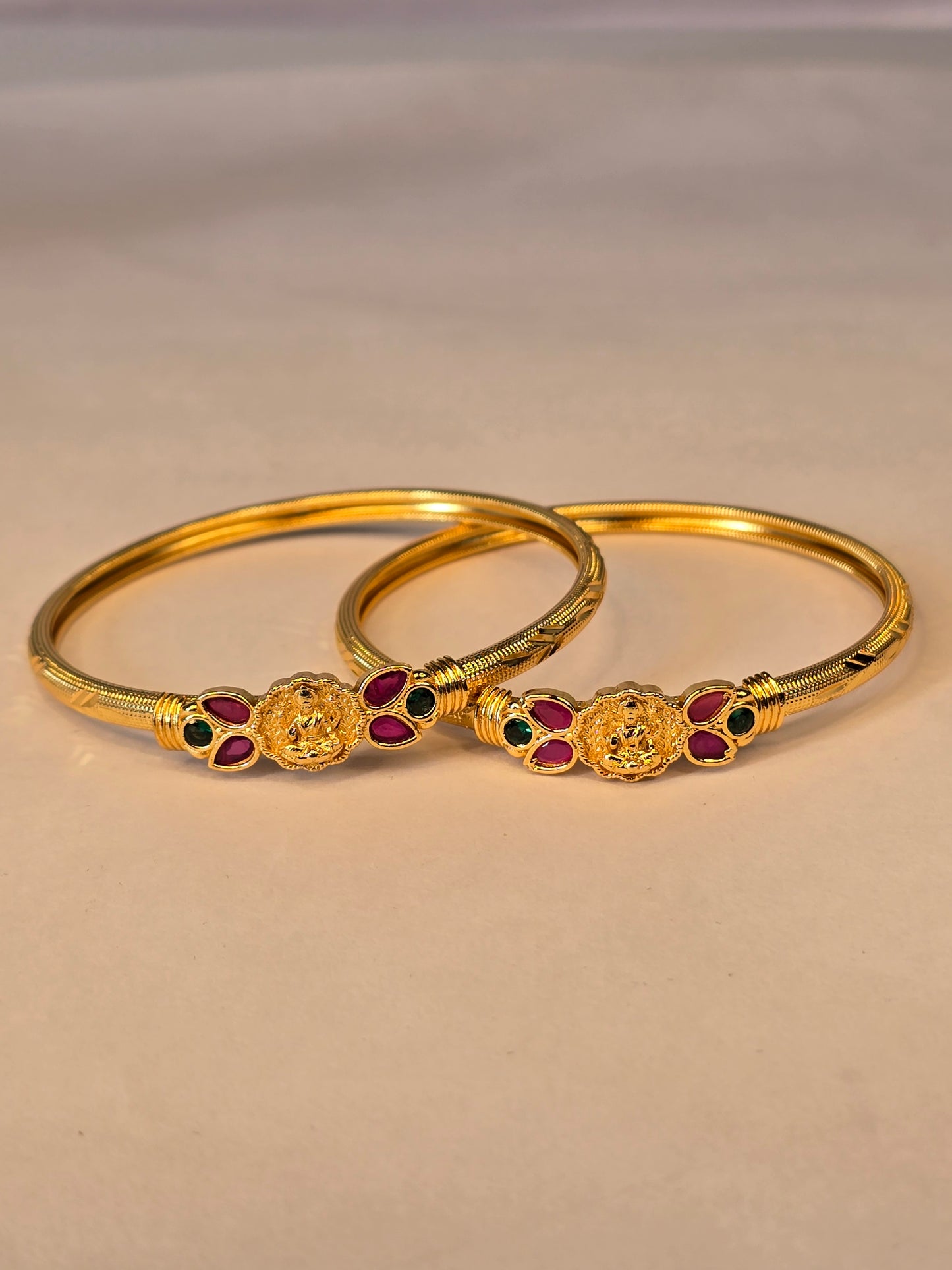NERONI Gold-Plated Lakshmi Motif Ruby & Emerald Bangles – Temple Collection