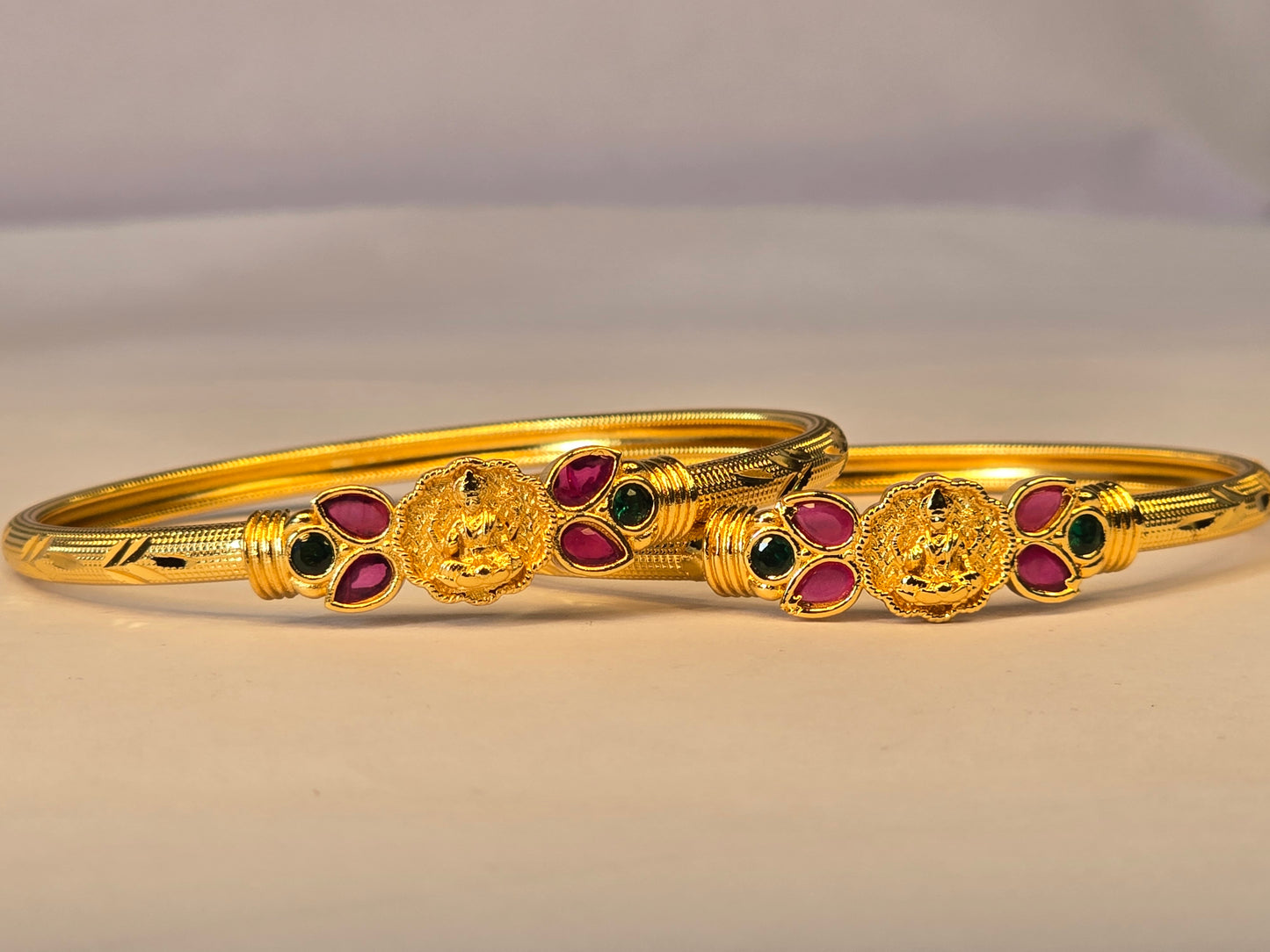 NERONI Gold-Plated Lakshmi Motif Ruby & Emerald Bangles – Temple Collection