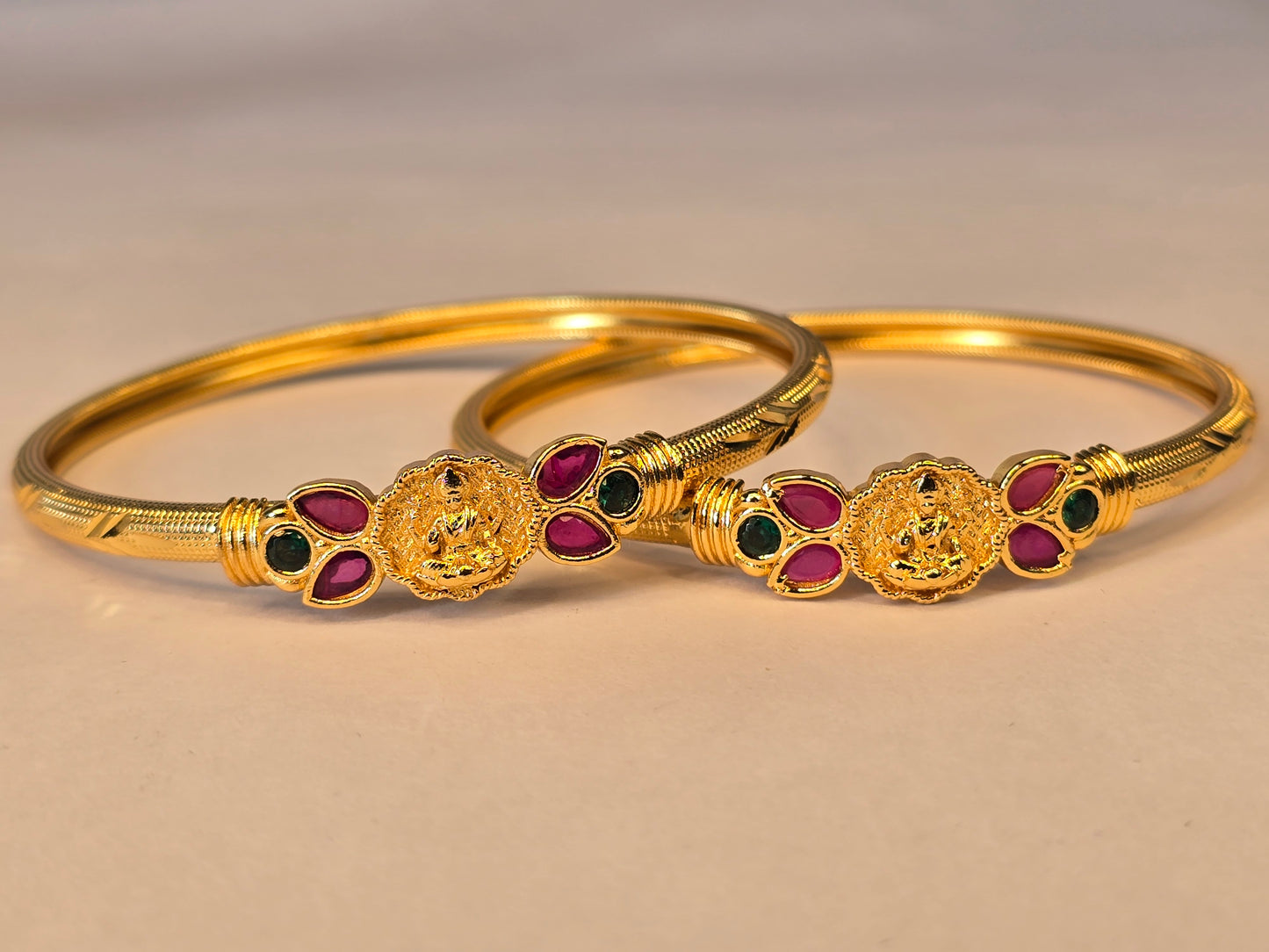 NERONI Gold-Plated Lakshmi Motif Ruby & Emerald Bangles – Temple Collection