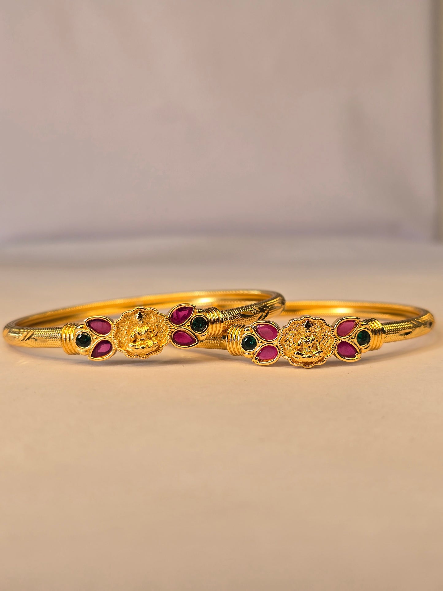 NERONI Gold-Plated Lakshmi Motif Ruby & Emerald Bangles – Temple Collection