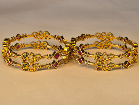 NERONI Gold-Plated Peacock Design Ruby & Emerald CZ Bangles – Royal Designer Edition (Pack of 4)