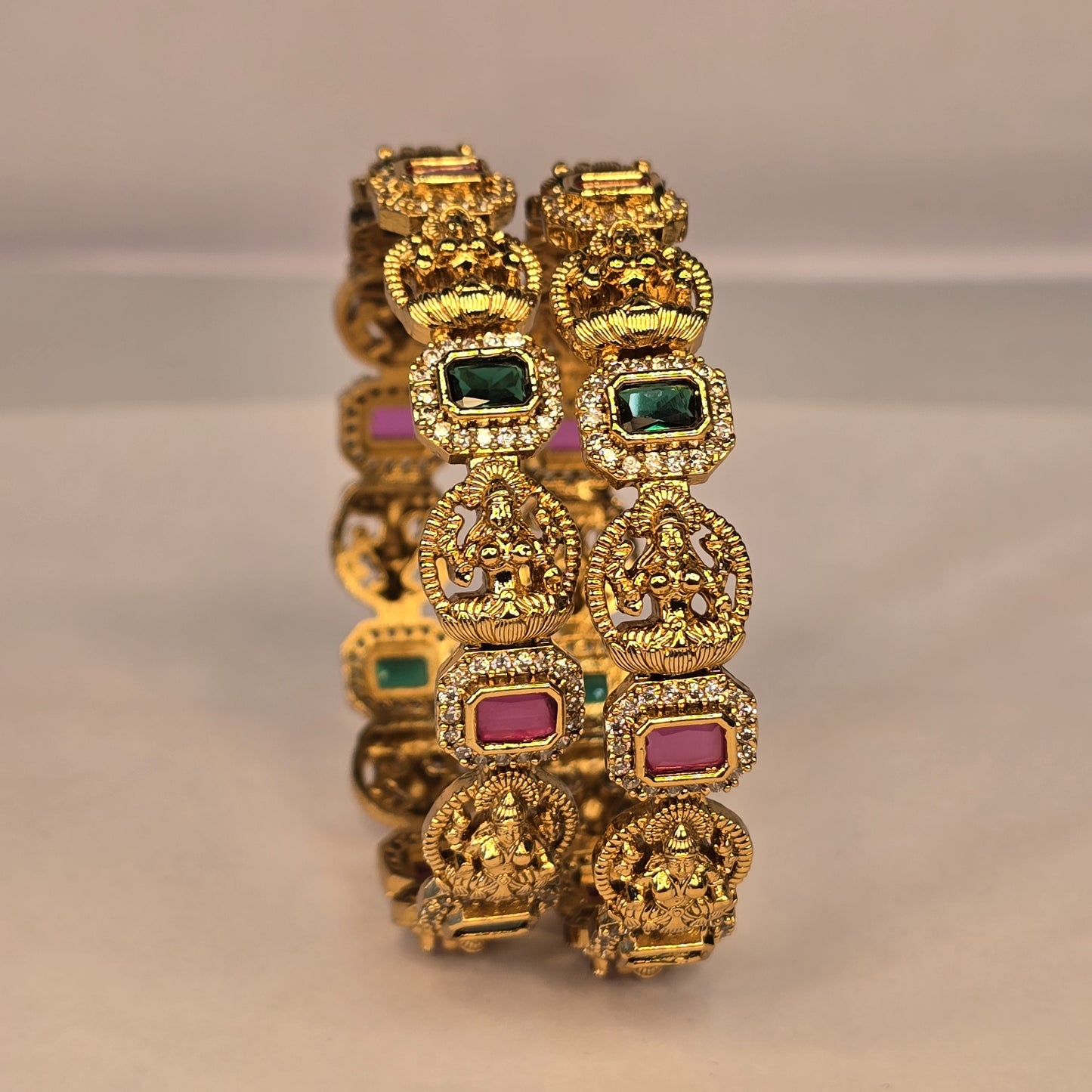 Neroni Temple Elegance Bangles – Gold Finish with Green & Ruby Stones